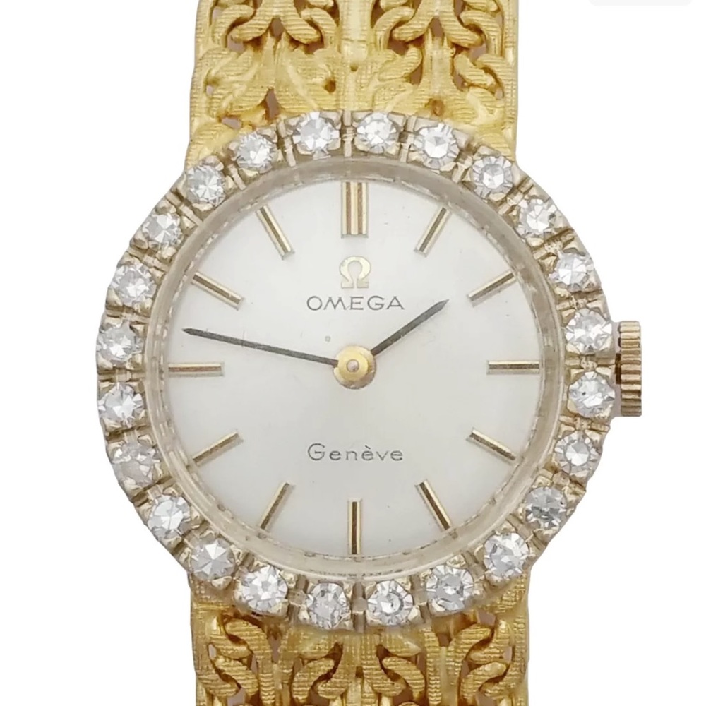 Omega 18k gold Diamond bezel 35grams.